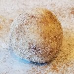 Snickerdoodle Cookie Ball covered in Cinnamon Sugar