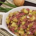 Corned Beef Hash in a white ceramic serving dish